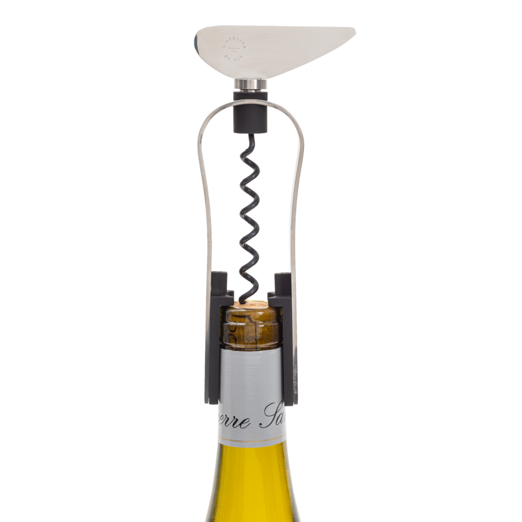 Endless screw corkscrew systems on a white wine bottle