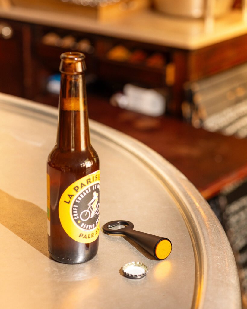 Stainless steel beer bottle opener coated with a PVD skin