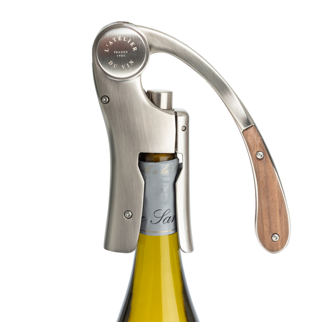 Lever corkscrew on wine bottle