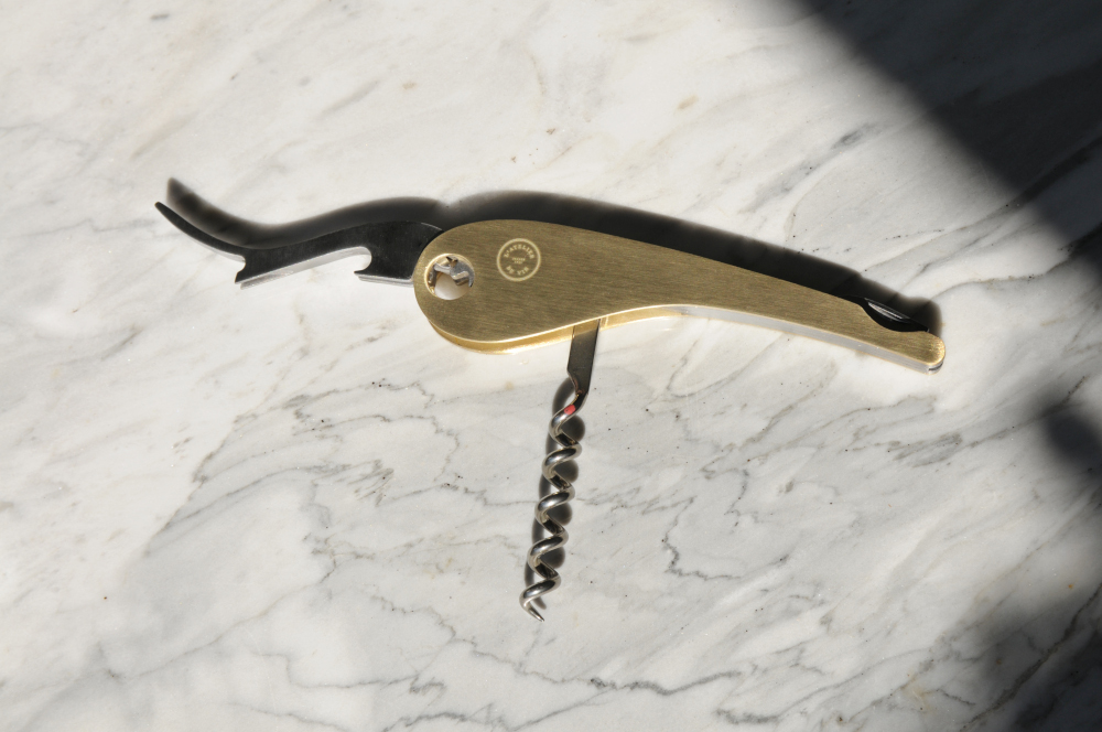 Soft machine brass corkscrew on counter